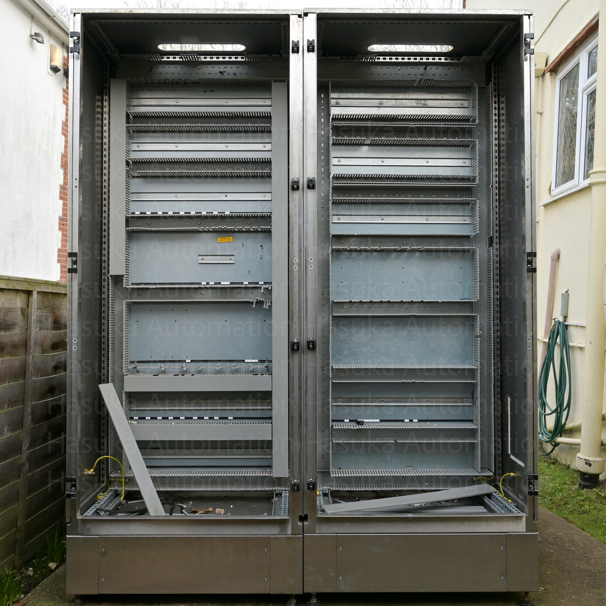 We have two good condition enclosures configured as one unit.