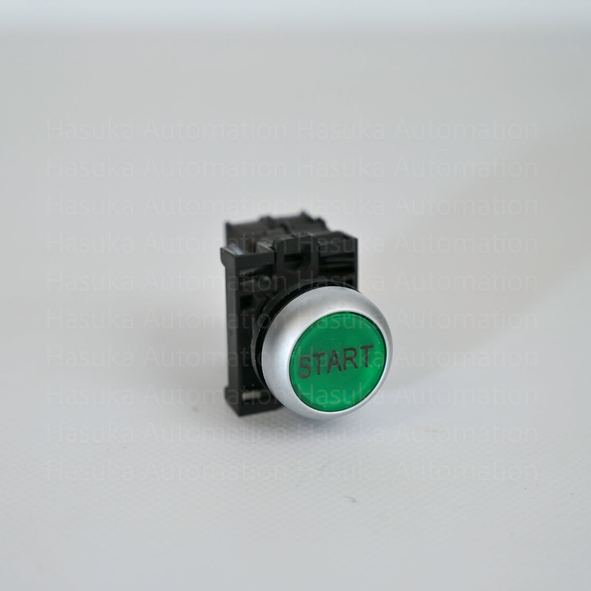 green illuminated indicator and operates on 12-30 vac/dc power